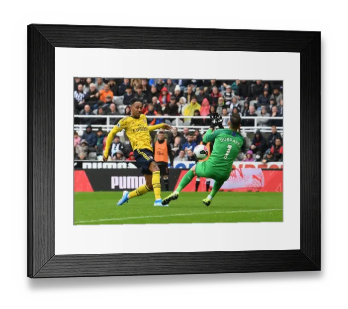 Framed Print : Aubameyang's Stunner: Arsenal Snatch Dramatic Win Against Newcastle in Premier League Framed Print : Aubameyang's Stunner: Arsenal Snatch Dramatic Win Against Newcastle in Premier League