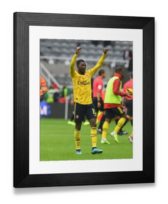 Framed Print : Arsenal's Ainsley Maitland-Niles Celebrates with Fans after Newcastle Victory Framed Print : Arsenal's Ainsley Maitland-Niles Celebrates with Fans after Newcastle Victory