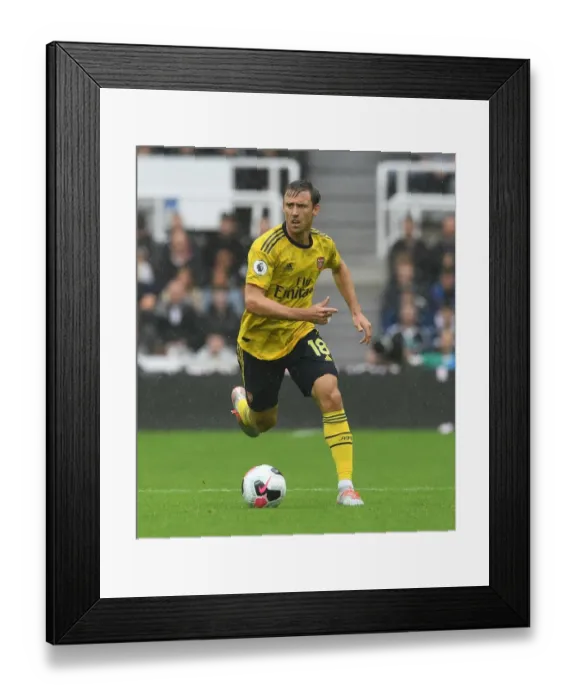 Framed Print : Nacho Monreal in Action: Arsenal vs. Newcastle United, Premier League 2019-20