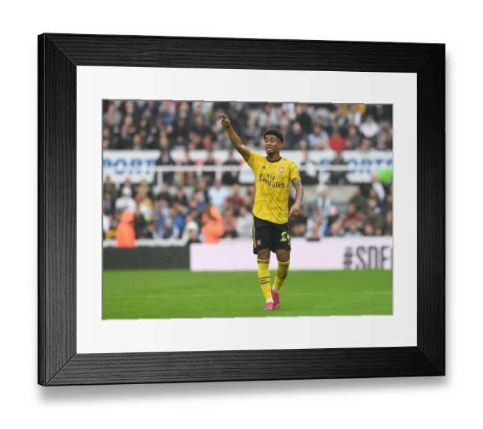 Framed Print : Arsenal's Reiss Nelson in Action: Arsenal vs. Newcastle United, Premier League 2019-20