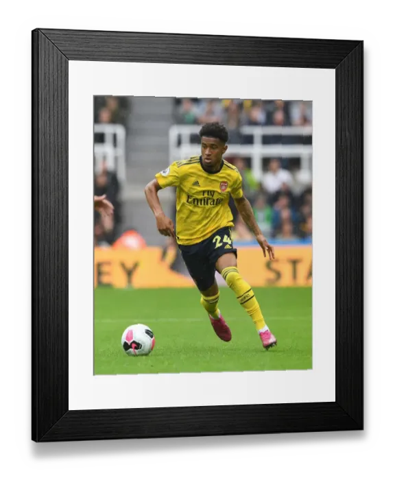 Framed Print : Arsenal's Reiss Nelson in Action: Arsenal vs. Newcastle United, Premier League 2019-20 Framed Print : Arsenal's Reiss Nelson in Action: Arsenal vs. Newcastle United, Premier League 2019-20