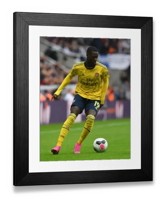 Framed Print : Pepe Leads Arsenal's Premier League Charge Against Newcastle United Framed Print : Pepe Leads Arsenal's Premier League Charge Against Newcastle United