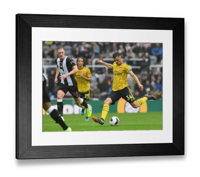 Framed Print : Granit Xhaka's Midfield Masterclass: Arsenal's Win Against Newcastle United