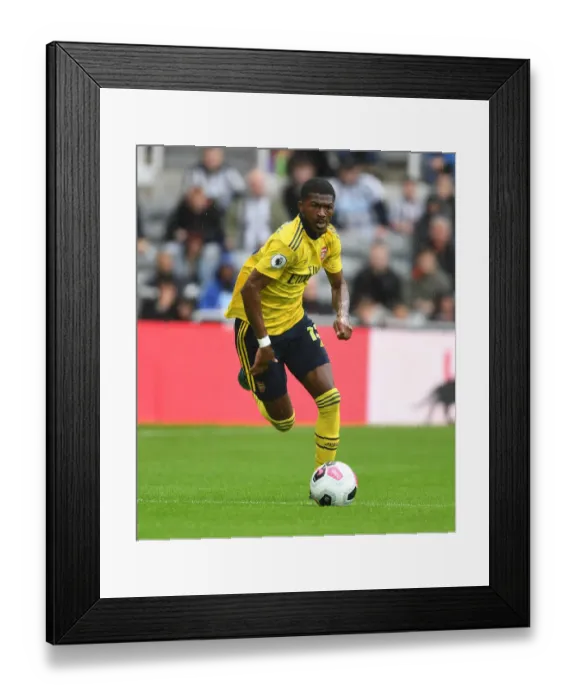 Framed Print : Arsenal's Ainsley Maitland-Niles in Action Against Newcastle United - Premier League 2019-20