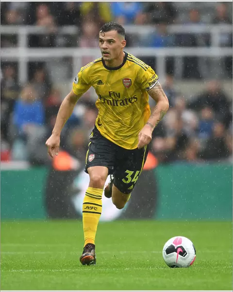 Granit Xhaka: Arsenal's Midfield Star Performs Brilliantly in Premier League Battle Against Newcastle United