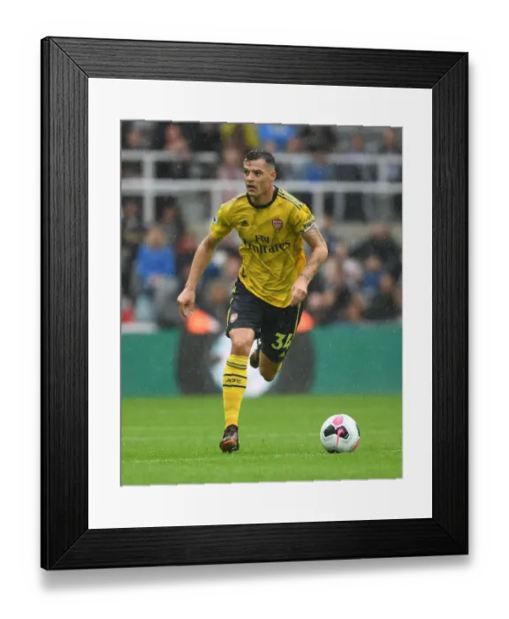 Framed Print : Granit Xhaka: Arsenal's Midfield Star Performs Brilliantly in Premier League Battle Against Newcastle United Framed Print : Granit Xhaka: Arsenal's Midfield Star Performs Brilliantly in Premier League Battle Against Newcastle United