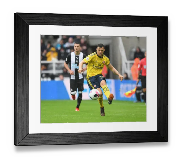 Framed Print : Granit Xhaka: Arsenal's Brilliant Midfield Performance Against Newcastle United