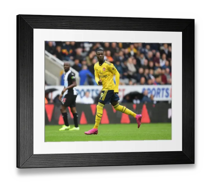 Framed Print : Pepe Leads Arsenal's Premier League Attack Against Newcastle United Framed Print : Pepe Leads Arsenal's Premier League Attack Against Newcastle United