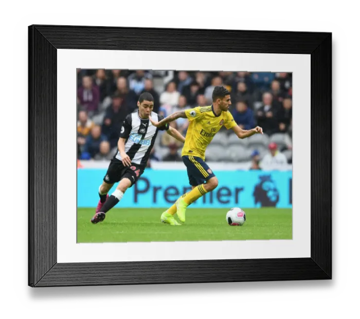 Framed Print : Dani Ceballos vs Miquel Almiron: Battle in the Premier League - Newcastle United vs Arsenal FC (2019-20)