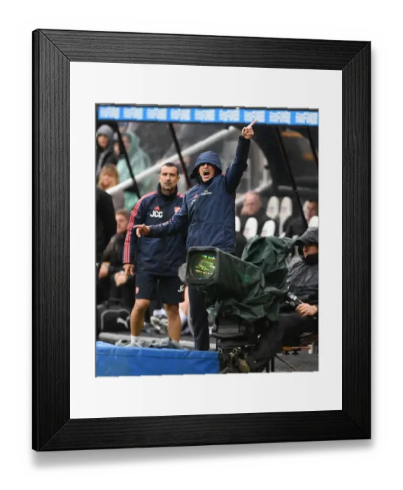 Framed Print : Unai Emery Leads Arsenal in Premier League Clash Against Newcastle United