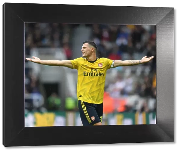 Granit Xhaka's Stellar Midfield Display: Arsenal Secures Victory over Newcastle United