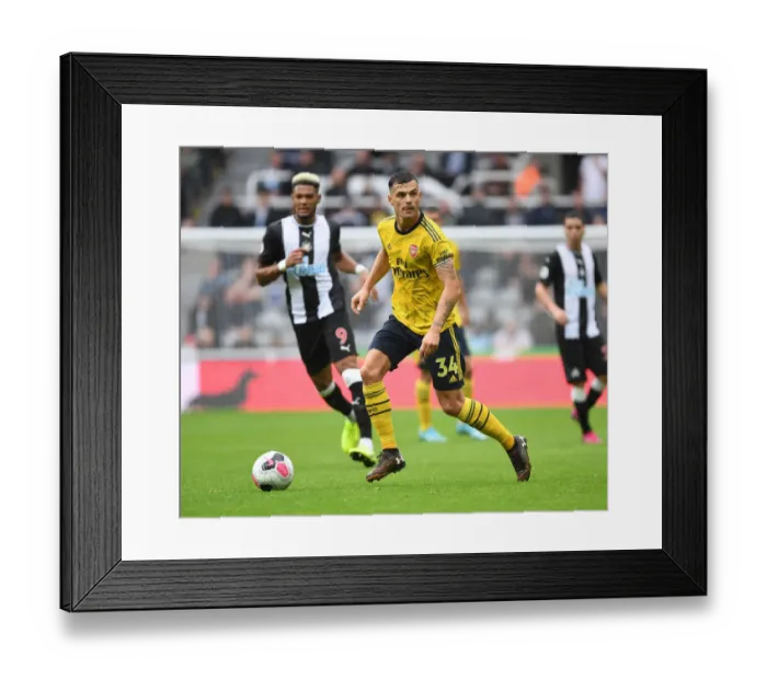 Framed Print : Granit Xhaka: Arsenal's Midfield Maestro Shines in Premier League Battle against Newcastle United Framed Print : Granit Xhaka: Arsenal's Midfield Maestro Shines in Premier League Battle against Newcastle United
