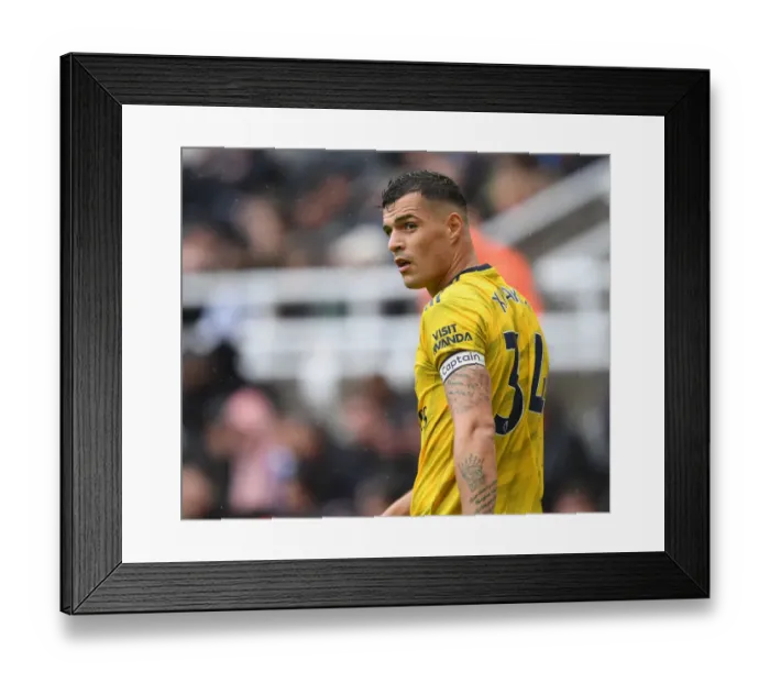 Framed Print : Granit Xhaka: Arsenal's Midfield Maestro in Action against Newcastle United, Premier League 2019-20