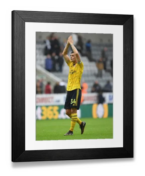 Framed Print : Granit Xhaka Applauding Arsenal Fans: Newcastle United vs Arsenal FC, Premier League 2019-20
