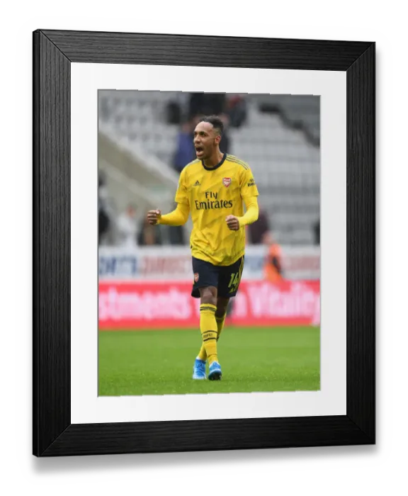Framed Print : Aubameyang's Stunner: Arsenal Kick Off Premier League Campaign with Win vs. Newcastle