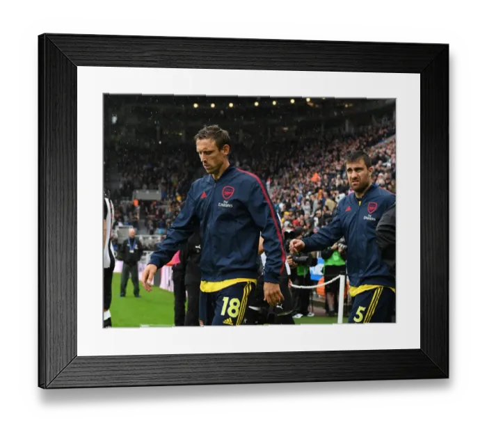 Framed Print : Arsenal's Nacho Monreal Leads Team Out vs. Newcastle United in Premier League Showdown (2019-20)