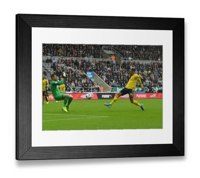 Framed Print : Aubameyang's Stunner: Arsenal's Winning Goal vs. Newcastle United, Premier League 2019-20
