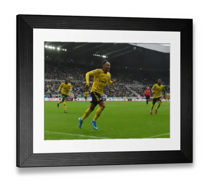 Framed Print : Arsenal's Aubameyang Scores St. James Park Stunner: Securing the Premier League Win over Newcastle United (2019-20) Framed Print : Arsenal's Aubameyang Scores St. James Park Stunner: Securing the Premier League Win over Newcastle United (2019-20)