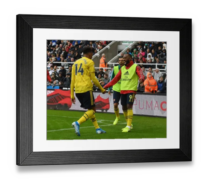 Framed Print : Arsenal's Aubameyang and Lacazette: Unstoppable Duo in Full Swing - Celebrating a Goal Against Newcastle United, 2019-20 Premier League Framed Print : Arsenal's Aubameyang and Lacazette: Unstoppable Duo in Full Swing - Celebrating a Goal Against Newcastle United, 2019-20 Premier League