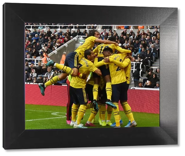 Arsenal's Aubameyang Scores in Newcastle Victory: Guendouzi and Mkhitaryan Celebrate