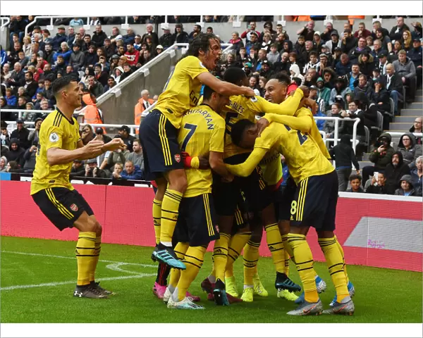 Arsenal Celebrate Aubameyang's Goal Against Newcastle United - Premier League 2019-20