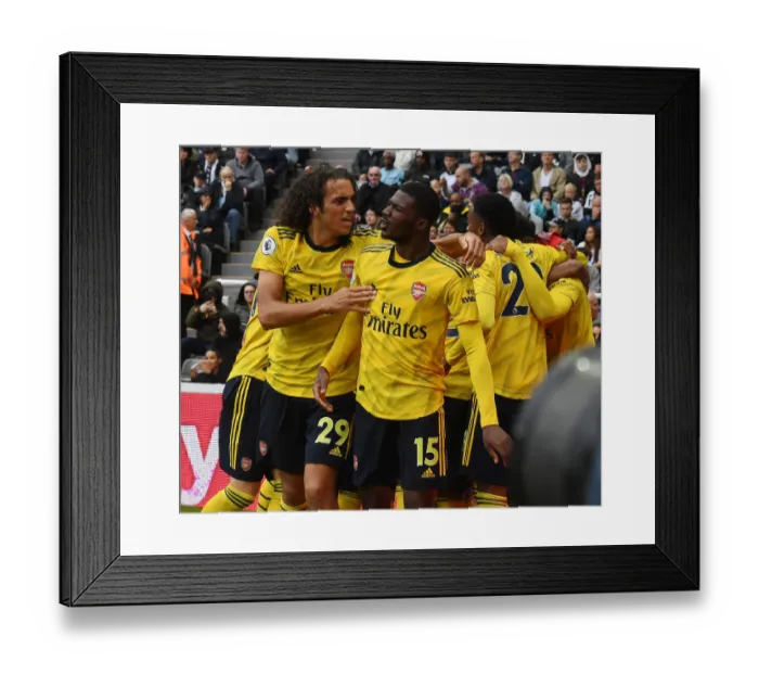 Framed Print : Arsenal's Guendouzi and Maitland-Niles Celebrate Goal Against Newcastle United (2019-20)