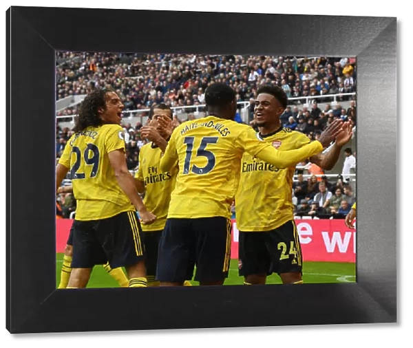 Arsenal Celebrate Goal Against Newcastle United in 2019-20 Premier League
