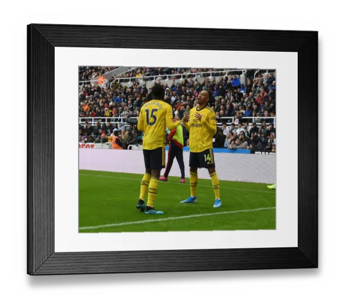 Framed Print : Aubameyang's Strike: Arsenal Triumph Over Newcastle United in Premier League Clash Framed Print : Aubameyang's Strike: Arsenal Triumph Over Newcastle United in Premier League Clash