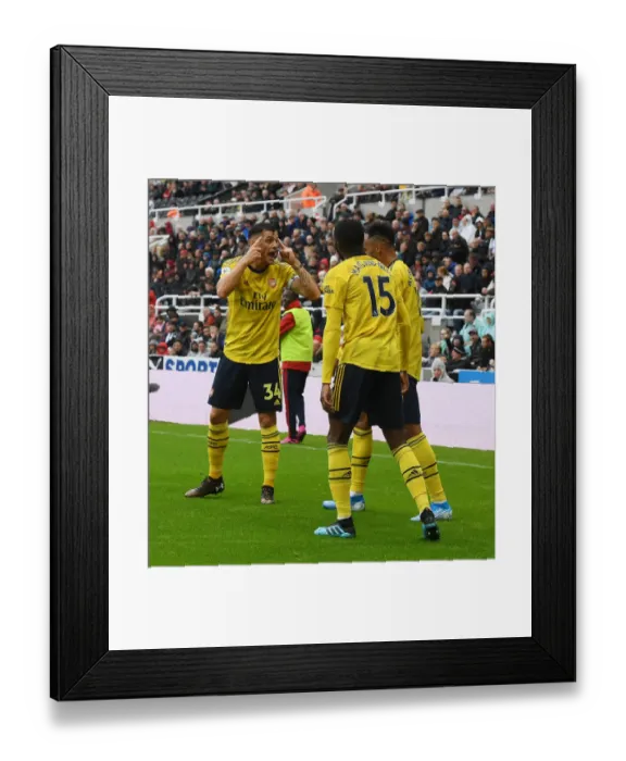 Framed Print : Arsenal's Xhaka, Maitland-Niles, and Aubameyang in Action against Newcastle United (2019-20) Framed Print : Arsenal's Xhaka, Maitland-Niles, and Aubameyang in Action against Newcastle United (2019-20)