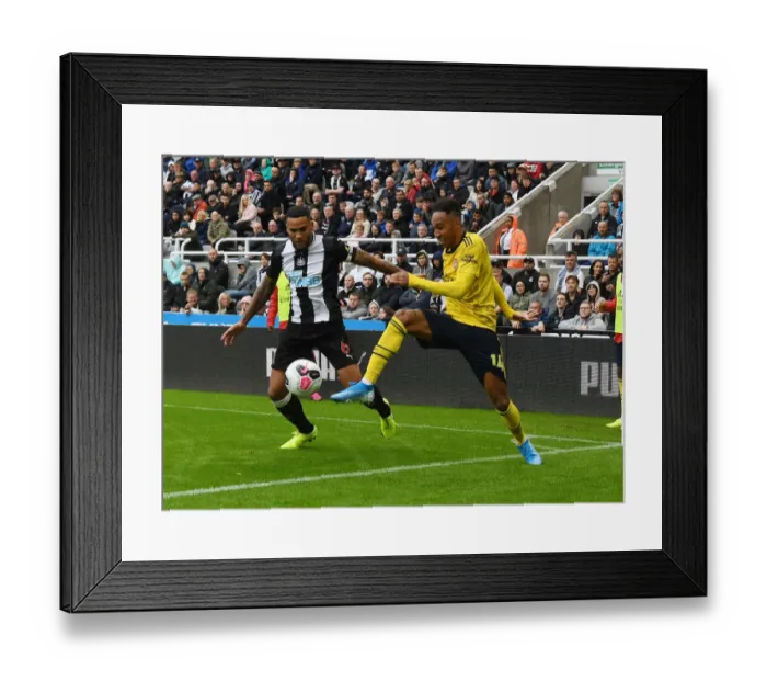 Framed Print : Aubameyang vs Lascelles: Battle at St. James Park - Arsenal vs Newcastle United, Premier League 2019-20 Framed Print : Aubameyang vs Lascelles: Battle at St. James Park - Arsenal vs Newcastle United, Premier League 2019-20