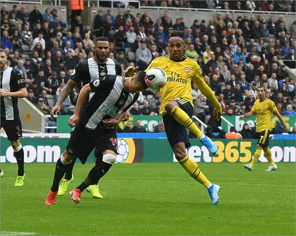Aubameyang vs Manquillo: Intense Clash in Newcastle United vs Arsenal FC Premier League Match