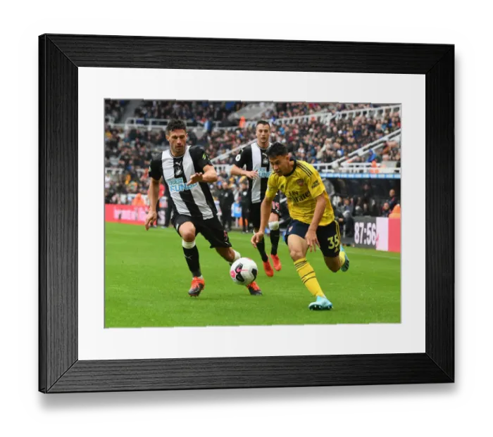 Framed Print : Martinelli vs Schar: Intense Battle in Newcastle United vs Arsenal FC Premier League Clash Framed Print : Martinelli vs Schar: Intense Battle in Newcastle United vs Arsenal FC Premier League Clash