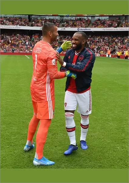 Arsenal's Alex Lacazette Greets Opponent Goalkeeper Before Emirates Cup Match