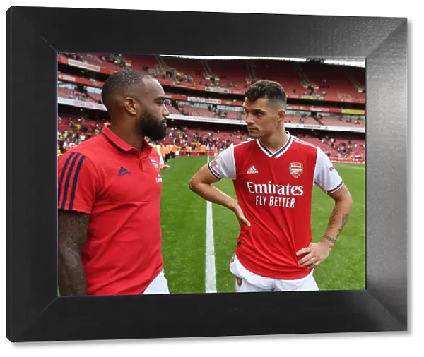 Arsenal's Lacazette and Xhaka Celebrate Emirates Cup Victory over Olympique Lyonnais