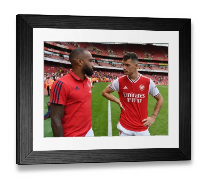 Framed Print : Arsenal's Lacazette and Xhaka Celebrate Emirates Cup Victory over Olympique Lyonnais