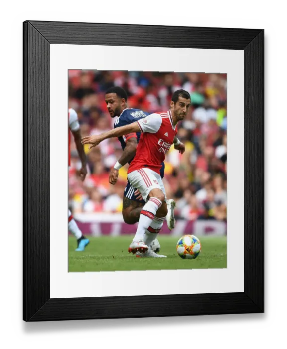 Framed Print : Arsenal vs. Olympique Lyonnais: Mkhitaryan vs. Depay Clash at Emirates Cup 2019