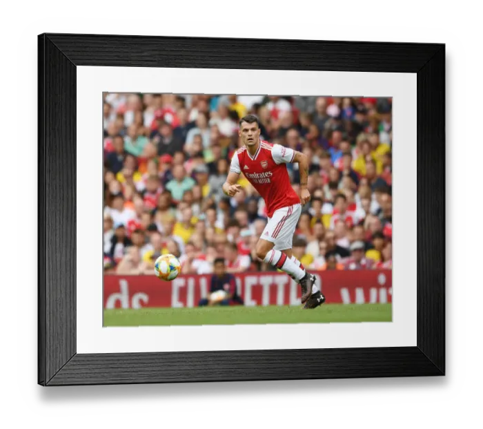 Framed Print : Granit Xhaka in Action: Arsenal vs. Olympique Lyonnais, Emirates Cup 2019