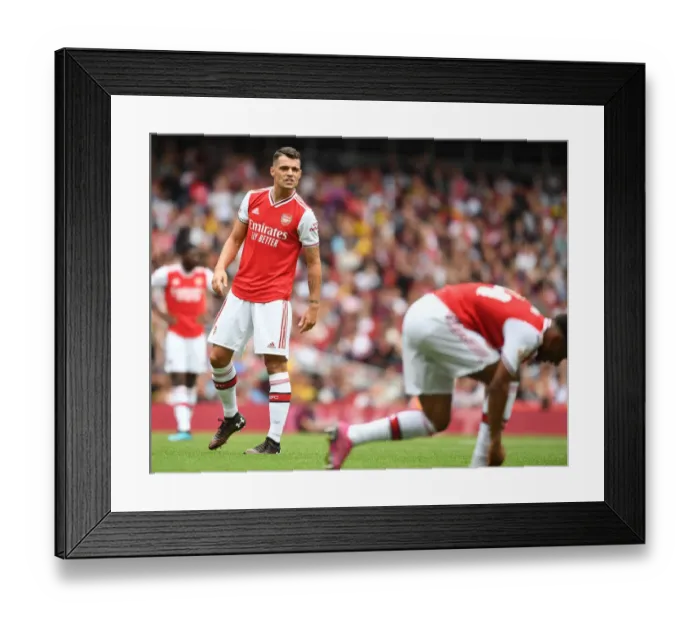 Framed Print : Granit Xhaka in Action: Arsenal vs. Olympique Lyonnais - Emirates Cup 2019