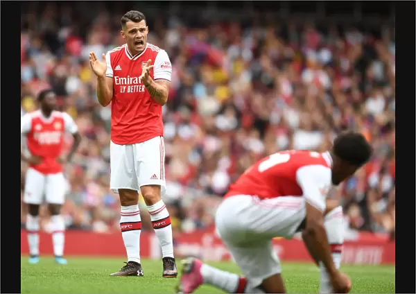 Arsenal's Granit Xhaka in Action against Olympique Lyonnais at Emirates Cup 2019