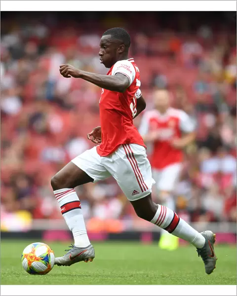 Arsenal's Eddie Nketiah in Action against Olympique Lyonnais at Emirates Cup 2019