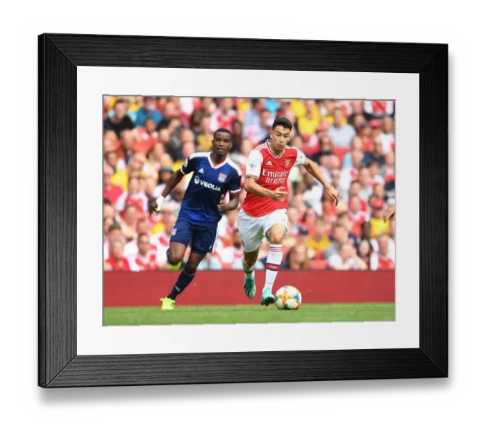 Framed Print : Arsenal's Gabriel Martinelli Shines in Emirates Cup Clash Against Olympique Lyonnais