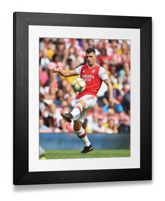 Framed Print : Granit Xhaka in Action: Arsenal vs. Olympique Lyonnais at Emirates Cup 2019