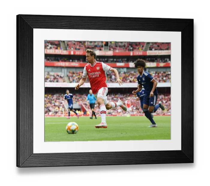 Framed Print : Arsenal vs. Olympique Lyonnais: Monreal Breaks Past Fofana at Emirates Cup, 2019