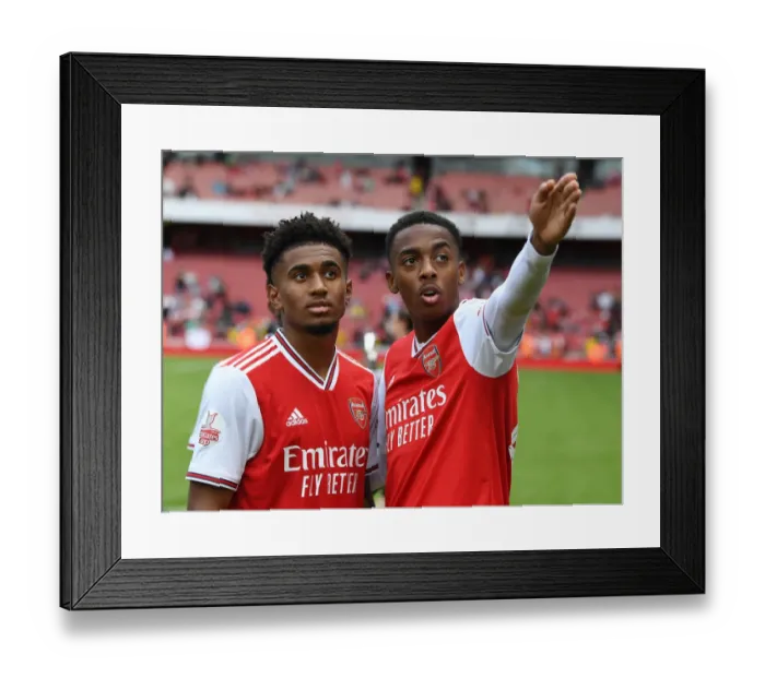 Framed Print : Arsenal's Reiss Nelson and Joe Willock Celebrate Emirates Cup Victory over Olympique Lyonnais