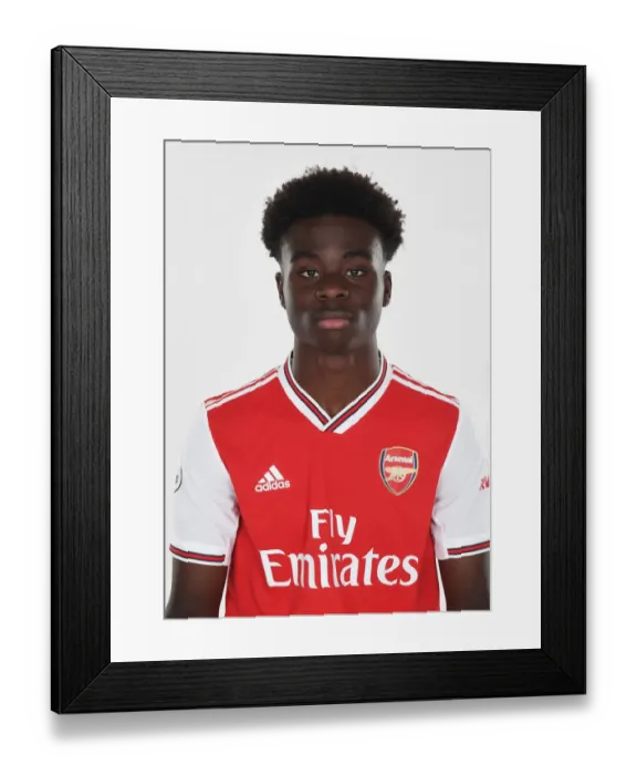 Framed Print : Arsenal's Bukayo Saka Kicks Off New Season Training Framed Print : Arsenal's Bukayo Saka Kicks Off New Season Training