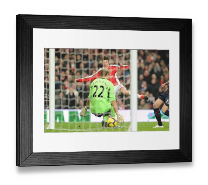 Framed Print : Cesc Fabregas shoots past Bolton goalkeeper Jussi Jskelainen to score the 2nd Arsenal goal Framed Print : Cesc Fabregas shoots past Bolton goalkeeper Jussi Jskelainen to score the 2nd Arsenal goal