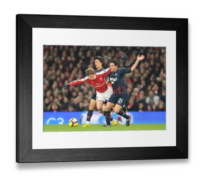 Framed Print : Andrey Arshavin (Arsenal) Tamir Cohen and Chung Yong Lee (Bolton). Arsenal 4 Framed Print : Andrey Arshavin (Arsenal) Tamir Cohen and Chung Yong Lee (Bolton). Arsenal 4