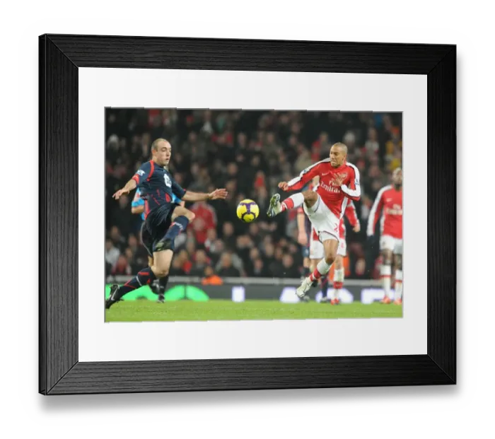 Framed Print : Gael Clichy (Arsenal) Gavin McCann (Bolton). Arsenal 4: 2 Bolton Wanderers Framed Print : Gael Clichy (Arsenal) Gavin McCann (Bolton). Arsenal 4: 2 Bolton Wanderers