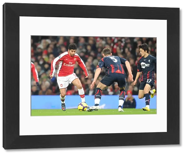 Eduardo (Arsenal) Gary Cahill and Chung Yong Lee (Bolton). Arsenal 4: 2 Bolton Wanderers
