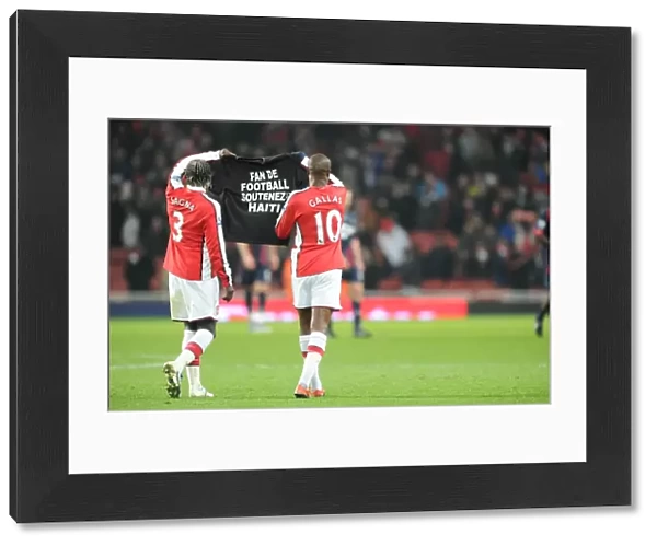 Bacary Sagna and William Gallas (Arsenal) show a tribute to the Haiti victims